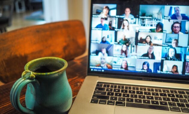 macbook pro displaying group of people