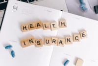 Health Insurance Scrabble Tiles on Planner
