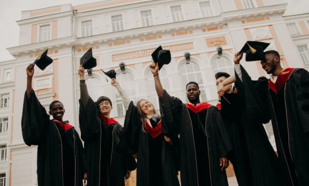 group of people wearing black academic dress